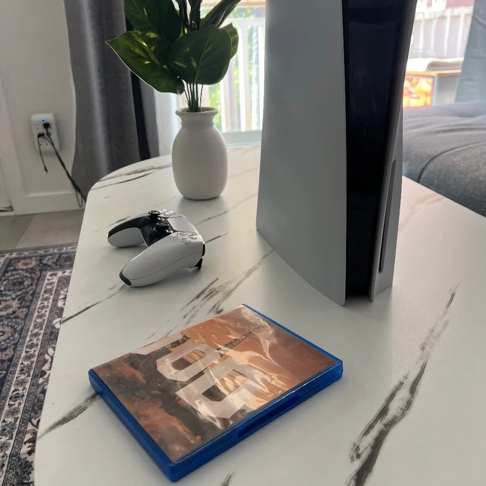 PlayStation 5 with controller and GTA 5